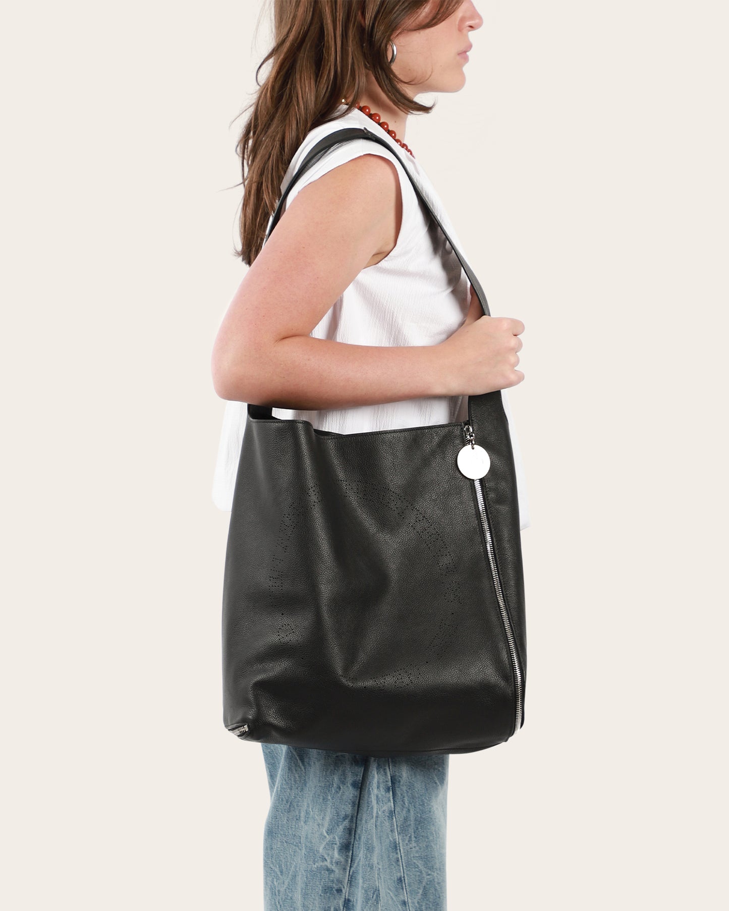 Expandable cross body